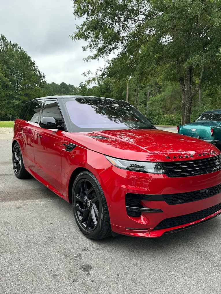 Red Range Rover Sport with freshly tinted windows